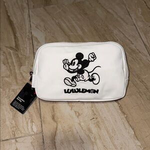Lululemon X Disney Everywhere Beltbag price tag removed Description tag attached